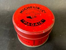 A Michelin vulcanising patches tin, with image of Mr Bibendum to the lid.