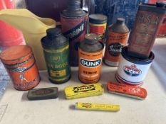 A selection of oil cans including BSA Lubricating Oil, Motorine, Amoco etc.