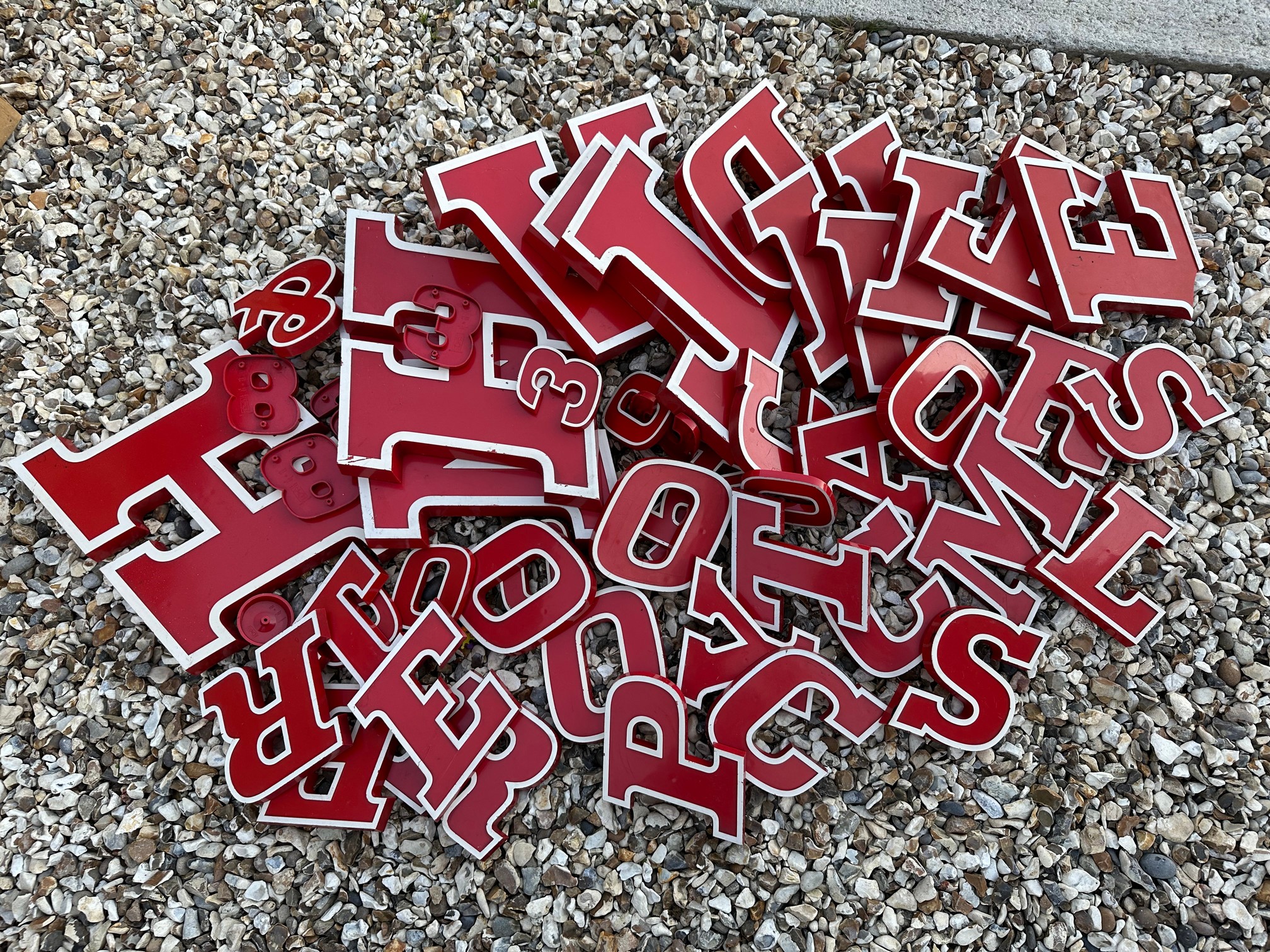 A quantity of circa 1960s showroom sign letters and numbers.