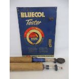 A Bluecol Tester tin sign with two tubes in original cardboard tubes.