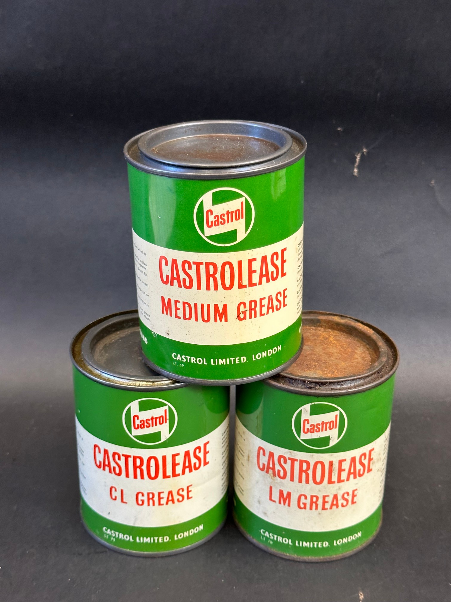 Three Castrolease grease tins.