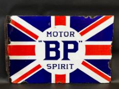 A BP Motor Spirit 'union jack' double sided enamel sign with hanging flange, dated December 1921,
