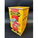 A Dunlop 'Silent Salesman' wall mounted tin cabinet dispensing cycle repair outfit tins.