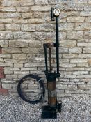 A Godwin skeleton petrol pump, unusually still with remains of 'Godwin' decal to the brass cylinder,