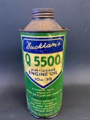 A Duckham's Q 5500 Engine Oil cylindrical quart can.
