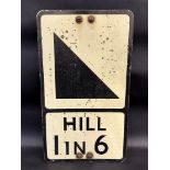 A reflective road sign for 'Hill 1 in 6', by Winsser, 12 x 21".