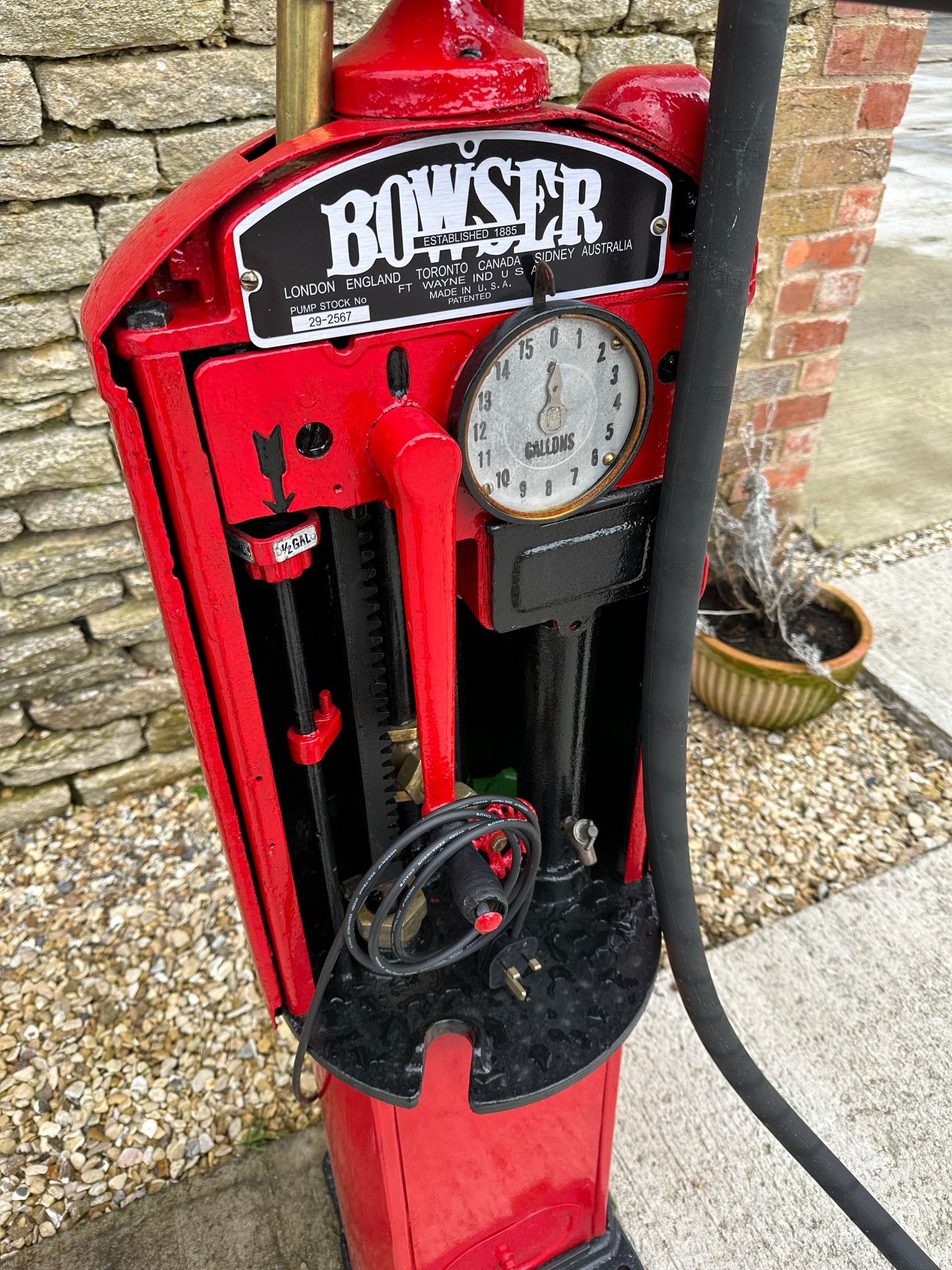 A Bowser hand-operated petrol pump, restored, with hose, nozzle and reproduction plastic petrol pump - Image 2 of 6