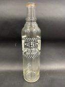 A Vigzol Vitafreeze quart glass bottle.