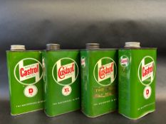 Four Wakefield Castrol Motor Oil quart cans.