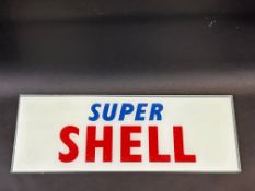 A Super Shell glass petrol pump brand insert, 18 x 6 1/2".