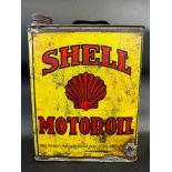 A Shell Motor Oil gallon can.