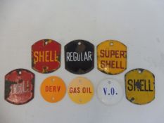 A tray of enamel brand plaques from tanks or pumps, including Shell, also three circular plastic