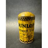 A small Dunlop patch strip tin with image of Mr Dunlop to the lid.