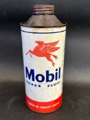 A Mobil Brake Fluid cylindrical quart can.