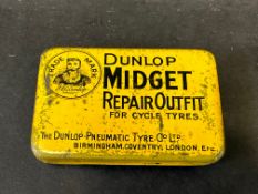 A very early Dunlop Pneumatic Tyres 'Midget repair outfit' tin.