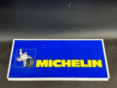 A Michelin rectangular tin advertising sign, 15 3/4 x 7".