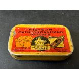 A Michelin Auto-Vulcanising Patches tin with pictorial design to the lid.