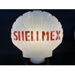 A Shellmex glass petrol pump globe, chip to neck.
