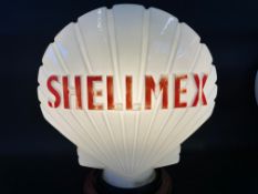 A Shellmex glass petrol pump globe, chip to neck.