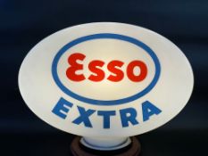 An Esso Extra glass petrol pump globe by Webb's Crystal, fully stamped underneath.