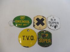 A quantity of enamel petrol pump/bulk tank brand indicator plaques including BP Energol, BP Super