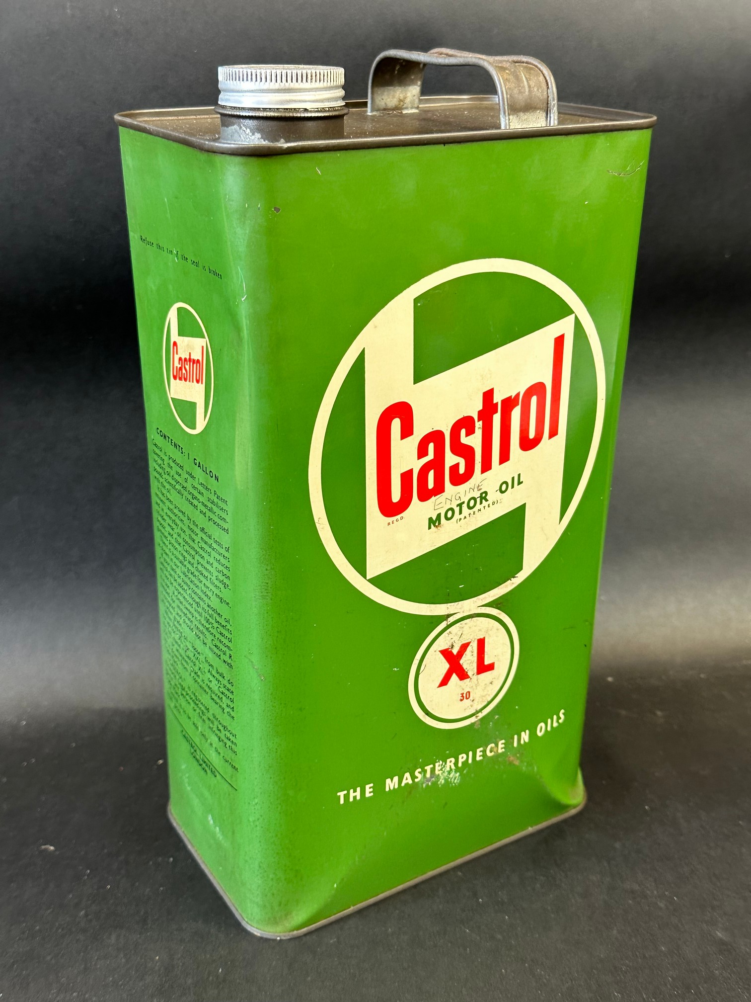 A Castrol Motor Oil XL grade gallon can of bright colour.