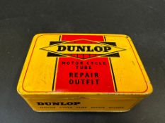 A Dunlop Motor Cycle Tube Repair Outfit tin in superb condition, with assorted contents.