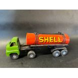 A Tri-ang tinplate model of a Shell and BP petrol tanker.