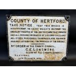 A cast iron notice sign - County of Hertford, 20 1/2 x 16".