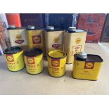 A selection of Shell quart oil cans, Shell grease tins etc.