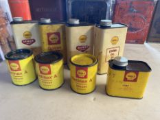 A selection of Shell quart oil cans, Shell grease tins etc.