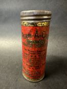 A Perm-A-Grip patches cylindrical tin.