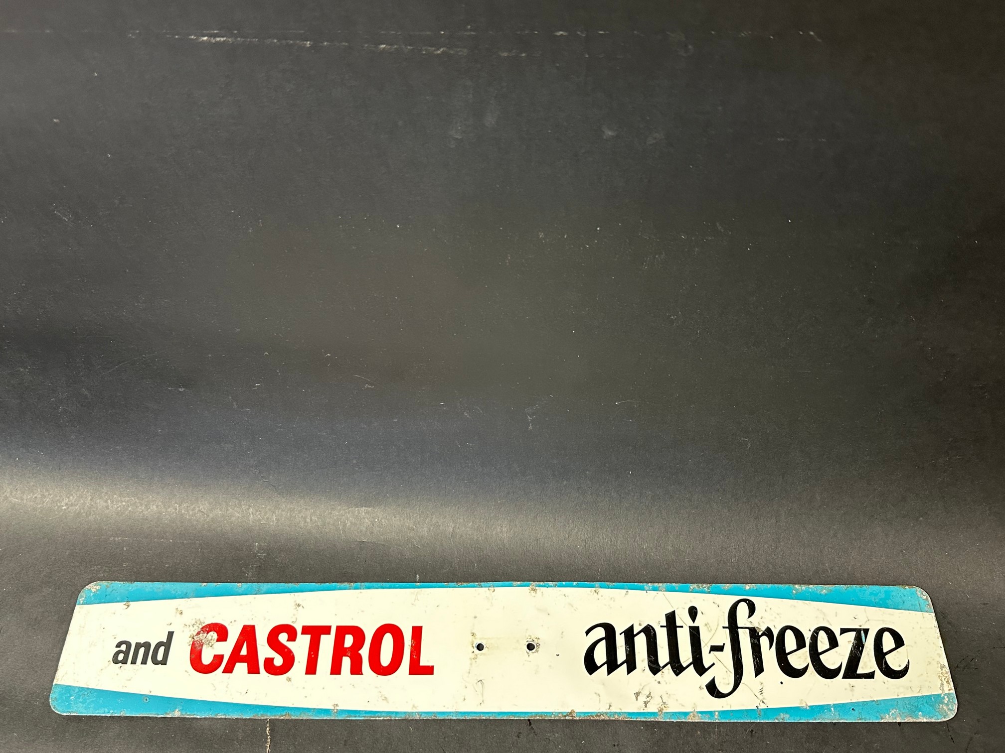A Castrol anti-freeze double sided pediment sign.