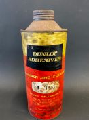 A Dunlop Adhesives cylindrical quart can with paper label.