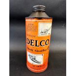 A Delco Shock Absorber Oil circular quart can.