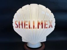 A Shellmex glass petrol pump globe by Hailware.