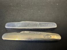 Two Michelin branded penknives, both with images of Mr Bibendum.