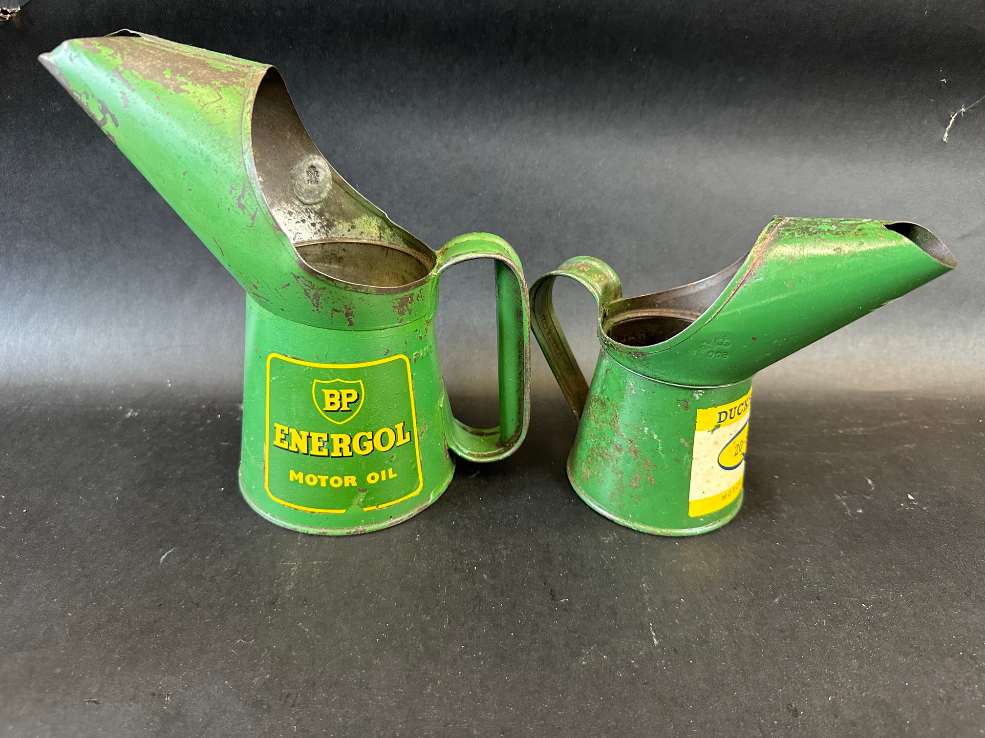 A BP Energol Motor Oil pint measure dated 1956 and a Duckhams 20-50 half pint measure dated 1965. - Image 2 of 3