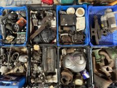 An autojumbler's lot in eight crates of assorted spares including carburettors, manifold etc.