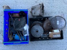 An Austin 7 gearbox, plus two boxes of assorted mechanical spares including clutch parts, a