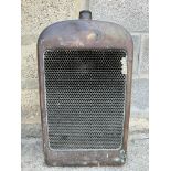 A Lagonda 11.9hp radiator cowl and core, lacks badge.