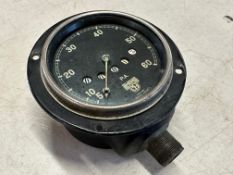 A Smiths 0-60mph black-faced speedometer, marked P.A. to the dial.