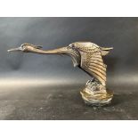 A rare French silver plated car accessory mascot in the form of a heron or stork, signed Paitken,