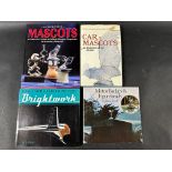 Four reference books on mascots.