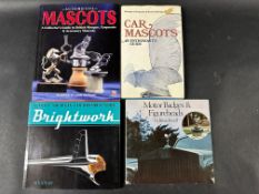 Four reference books on mascots.