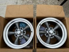 A set of four boxed Eagle Alloys 15 x 8" rim wheels.