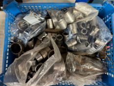 A crate of assorted socket spanners, dies, open ended spanners etc.