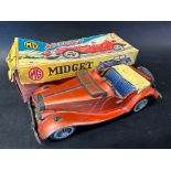 A Japanese tinplate friction model of an MG TF Midget, in original box.