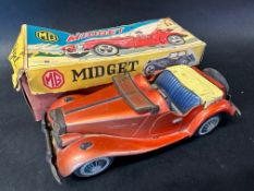 A Japanese tinplate friction model of an MG TF Midget, in original box.