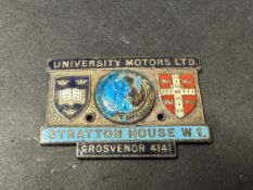 A University Motors dashboard supplier's plaque, 1930s.